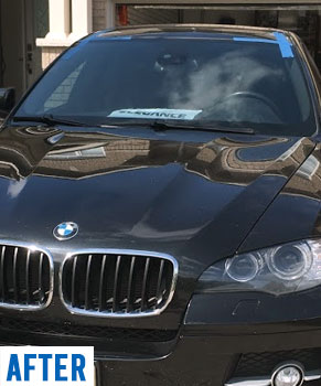 black BMW X6 using mobile windshield replacement service after