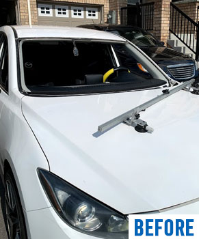 white mazda 3 broken front windshield before by Ram Auto Glass of Richmond Hill