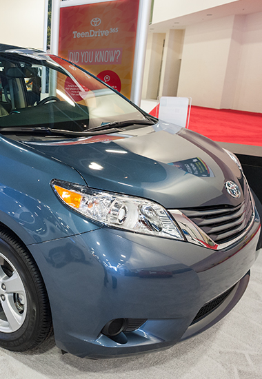 the front photo of Toyota Sienna family van by Ram Auto Glass